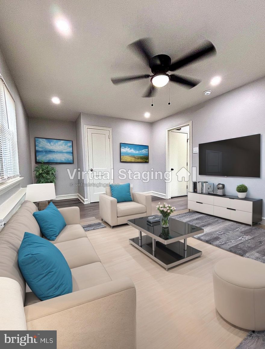 Be the first to enjoy this beautifully remodeled, 2nd floor apartment, for rent. Very spacious with open area living/dining rooms and kitchen.  Brand New Kitchen has all brand new stainless steel appliances including a gas stove, microwave and refrigerator. Large bathroom with a tub/shower combo, and linen/storage closet.  All new flooring and freshly painted throughout. Monthly rent includes common area maintenance, sewer and cold water. Tenant pays all utilities.  Property available today for an annual lease.