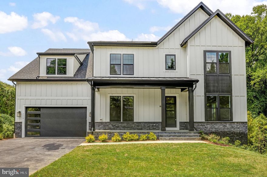 Pre-Construction Opportunity!!! – Nov/Oct 2025 completion forecast. Quality, Value, and Location! Luxury living on .46-acre lot in the highly sought-after neighborhood of Mantua Woodson HS district! Convenient location with easy access to Rt 236, 495 and 66 and tons of shopping and dining options just minutes away in Fairfax. 
We are proud to present our most popular floor plan - The Chapman. Our List Price includes our Diamond Included Features Package with the ability to further personalize this home by selecting from the following Structural Options: Morning Room Extension, Main level Guest Suite with full bathroom, Butler’s Pantry, Laundry Room Cabinets with Sink and optional Basement areas such as: Rec Room, Bedroom, Full Bathroom, Media Room and Exercise Room. Upon arrival in the foyer, you are welcomed by gleaming hardwood floors, dual staircases featuring a modern metal horizontal balusters with wood handrail, Living Room and formal Dining Room. Our Designer Kitchen is sure to impress with maple cabinets up to the 10’ ceiling with glass faced upper level featuring soft close cabinets and drawers and quartz countertops provide a sleek and elegant feel. The kitchen also features an enormous island with gracious seating and extra storage. Designed with the family in mind, the Great Room includes a modern linear gas fireplace with a separate wall for the entertainment center as well as an impressive high profile coffered ceiling detail on the 10’ ceiling. The Mud Room provides ample space for shoes, backpacks, and sports equipment and leads to the 3-car side entry garage. Working from home is easy and enjoyable w/the main level Den located in the back left of home and you can opt to close in the Living Room to create a 2nd home office. Enjoy the 12’ x 20’ deck sitting high above the private wooded backyard. On the upper level, the shining star is the layout of the huge Master Suite with Sitting Room and over-sized Walk-In Closets. Clients tell us the access to the Walk-In Closet from both the bedroom and bathroom is one of the homes best design features. The Owner’s bedroom also features two box ceilings. The Owner’s bathroom features a large Frameless Shower, soaking tub as well as great storage as part of the his and hers sinks and vanities. Each of the 3 additional upper-level bedrooms are ample size with one on-suite bath and one Buddy Bathroom. Our Homes Always Include Quality Features including whole house fan on the second level with ability to improve the air quality within the entire home, Humidifier, Electronic Air Cleaner, abundant recessed lighting, best in class 10-year transferable Builder’s Warranty, 2X6 upgraded framing, thermal insulation, and pest tubes in the exterior walls and much more round out the features of this home.