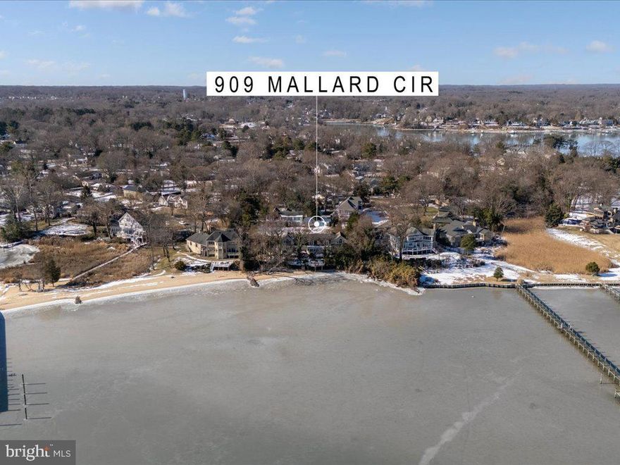 Discover an exceptional opportunity to own prime waterfront real estate on one of the most sought-after streets in desirable Ulmstead Estates. Every day feels like a vacation in this home, set against a breathtaking Magothy River backdrop and nestled within a vibrant, amenity-rich community.
This expansive 0.59-acre property offers unmatched potential to create your dream waterfront retreat. With just under 4,000 sq. ft. above grade plus an additional 1,600+ sq. ft. on the lower level, the possibilities are endless. The existing layout features four generously sized bedrooms upstairs, including a waterfront primary suite and an additional waterside en suite bedroom—a rare and desirable feature. Two wood-burning fireplaces, one in the living room and another in the sunroom, add warmth and character, while an oversized two-car garage provides ample storage and convenience.
Beyond the home itself, Ulmstead Estates offers an unparalleled lifestyle with two private marinas, boat slips, lighted tennis and pickleball courts, an outdoor pool and swim team, a waterfront playground, and year-round community events. Located just minutes from major commuter routes, BWI Airport, and Historic Annapolis, this home provides the perfect balance of convenience and tranquility.
Whether you envision a full renovation to create a legacy estate or an investment in an incredibly rare waterfront opportunity, this is your chance to bring your vision to life. Don’t miss out on making this stunning waterfront setting your own.