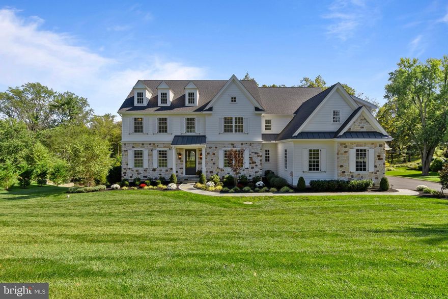 Welcome to 1052 Prescott Road, a stunning custom residence built by Moser Homes & Achristavest Homes.   This exquisite home offers an expansive 6,947 square feet of living space, featuring five spacious bedrooms, five full baths, and two powder rooms, seamlessly accommodating modern lifestyles.

As you step inside, you'll be greeted by the grandeur of a two-story foyer, setting the tone for the home's open and inviting atmosphere. Hardwood floors and coffered ceilings flow throughout, enhancing the feeling of warmth and space. The formal living room, complete with a gas fireplace, is perfect for cozy gatherings, while the formal dining room, adjacent to a butler's pantry, is ideal for entertaining.

The heart of the home is the gourmet kitchen, equipped with top-of-the-line Thermador appliances, custom cabinetry, and a generous 12-foot island. Whether you're preparing a meal or enjoying casual family dining, this kitchen is a dream come true. The adjacent family room, with its own fireplace, opens to a delightful screened-in porch, offering a perfect blend of indoor-outdoor living.
Retreat to the primary suite, a sanctuary featuring a spacious walk-in closet and a luxurious en-suite bathroom with dual vanities, a soaking tub, and a glass-enclosed shower. Additional bedrooms include two with en-suite baths and two sharing a Jack and Jill bathroom, ensuring privacy and convenience for family and guests alike.
The lower level is a versatile space, perfect for a gym, game room or an additional lounging area.  Enjoy walk-out access to the stunning backyard and a lovely patio area.  You can also take in the beauty of nature from your deck, or consider the possibilities of the expansive lot for outdoor entertaining or even a future pool.

This home is thoughtfully designed with incredible finishes throughout.  Located in the award-winning TE school district and close to many highly rated private schools in the area as well.  Experience the blend of luxury and charm at 1052 Prescott Road—a place you'll truly want to call home.