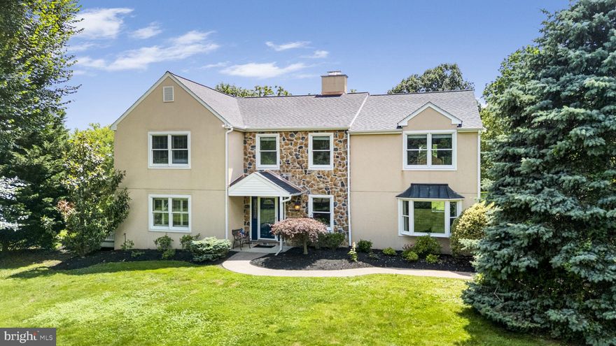 Welcome to 558 Skippack Pike! This stunning and beautifully renovated home is set on over 1.6 acres in the highly sought after Wissahickon School District. Blending timeless charm with modern upgrades, this property offers exceptional indoor and outdoor living. Inside, you'll find oak hardwood flooring throughout, an expansive floor plan, and abundant natural light. Enter into the inviting entry that opens to the spacious, formal living and dining room. The heart of the home is the custom kitchen—complete with custom wood cabinetry, granite countertops, tin ceiling, recessed lighting, Bosch stainless steel appliances, and a center island—flowing seamlessly into the spacious dining area with a fireplace, built-in workspace, and a bay window bathing the space in sunlight. The kitchen opens to the main living space which includes a 2-story ceiling, custom built-ins, and a dramatic wall of windows overlooking a low-maintenance Trex deck, offering beautiful views of the private backyard. The convenient main floor office offers plantation shutters and access to the cozy side porch. The whole home ethernet system provides reliable internet access- creating a great work-from-home environment. The laundry room is a versatile space serving as a laundry room, bathroom, and pet washing station, featuring ample storage and a tub- perfect for pets or utility use. Additionally, the mudroom offers more storage space, an antique sink, and access to the main living room, as well as access to the garage, driveway and yard. Upstairs, the grand primary suite features a large walk-in closet with custom organizers, a sitting room, and an ensuite bath with soaking tub and walk-in shower. Three additional bedrooms with tons of closet space and a full bathroom with a laundry shoot complete the second floor. The partially finished, walk-out basement includes a family room, home gym, storage space, and a workshop area, all equipped with a french drain system for peace of mind. Outside, enjoy a fully fenced-in yard, ideal for pets or play! The landscaped yard includes mature trees and wide open green space, perfect for entertaining or relaxing. Take advantage of the 2-car attached garage and 2-car detached garage, separated by a semi-covered stone patio. The brand new roof will bring you peace of mind! Conveniently located shopping, dining, and major commuter routes, this unique property offers the rare combination of privacy, space, and convenience in a top-rated school district.