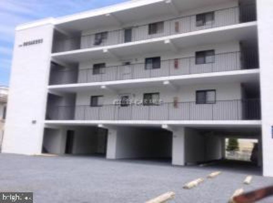 Great beach getaway just steps to the beach in North OC.  Cozy 1BR,1BA with open floor plan, newer carpet, updated kitchen with breakfast bar, large bedroom and deck with glimpse of the ocean. Neat, clean, bright and cheerful and ready for you. Reasonable condo fees. 1 parking space. Close to everything Ocean City has to offer.  Priced to sell quickly.