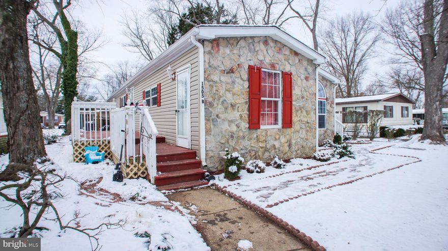 This home features 4 spacious bedrooms and 3 full bathrooms with a great layout.  Kitchen and dining area, adorned with crown moldings. The kitchen includes modern appliances such as a refrigerator, dishwasher, and microwave, making meal prep a breeze. Enjoy the convenience of insulated windows that enhance energy efficiency, while the dedicated laundry area ensures practicality. Outside, the beautifully landscaped lot provides a serene setting, complemented by a handy shed for additional storage. With assigned parking for two vehicles, accessibility is a breeze. This is a must see, don't miss out!