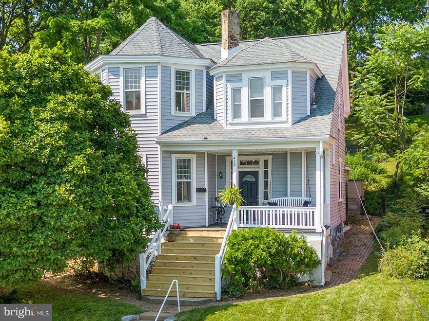 Have you ever wondered what it’s like to step back in time 100+ years and still have the modern conveniences of today? With sweeping views of Brunswick, this stately Victorian marries the charm of the late 1800’s and present day features.  Owners have taken care to update the oil tank, double ovens, porch steps, basement door, fresh paint, deck and thoughtfully added durable luxury vinyl plank throughout matching the aesthetic.  Over 2500 sq feet of living space and 10 foot ceilings, they just don’t make them like this anymore!  
Stroll up to the entrance and enjoy the idyllic views from the porch swing.  Entering the foyer, the historic details of arched doorways and corner block add charm throughout. Large formal living room with bay windows is light and bright and a generously sized dining room brings the wow factor when entertaining.  Family room provides extra living space and cozies up with a propane fireplace.  The kitchen is a dream, expanding the back side of the house with a walk-in pantry, half bath, cooktop, double ovens, open shelving, and island. Your sourdough will love it here! Sip your coffee on the deck, through the sliding glass doors, enjoying the hydrangeas.  
Upstairs the primary bedroom bay windows bring light, with privacy from the front yard tree.  Wainscotting adds an elevated feel to the large haven.  A built-in bookshelf, spanning the width and length of the hallway, is one out of fairytales. The three other bedrooms impress with notable details and space. A versatile bonus room has so much potential as an office, playroom, home gym or craft area. Laundry is also located on this level for ease of living. Two full bathrooms round out this space!
One of the larger lots in Brunswick, the backyard also brings potential for gardens or a grassy knoll and provides a pleasing view from the kitchen and back bedroom. Playhouse conveys - a space for imaginative play!  
Brunswick is a small town feel with a big heart!  Very commuter friendly to Baltimore and DC with a MARC train stop too.  Great walkability to Brunswick and the C&o canal/Potomac river for those that love the outdoors and small town life! Walk to Boxcar Burgers, Beans in the Belfry, three new bakeries and you never have to find parking for the Veterans Day parade, or any of the downtown festivals. Ride your bike to Harper’s Ferry directly from the house! Timeless architecture, spacious interior and everyday comforts come together in this beautifully preserved home; offering a rare opportunity to own a piece of history!