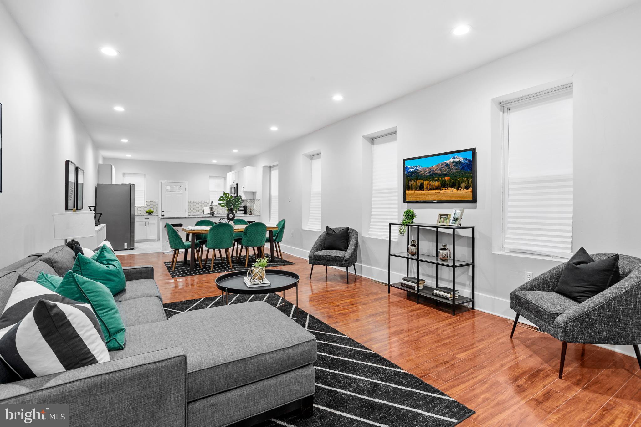 Have you been waiting for a spacious, newly remodeled home? Welcome home to 5944 Catharine Street! Located on a lovely block, this home has been fully remodeled from top to bottom and is waiting for its new owner. This home boasts approximately 2500 square feet of space. As you walk into the 1st floor, you'll notice the enclosed porch with a window seat. Also on this floor are an incredibly spacious and beautiful living room, dining room, and eat-in kitchen. The kitchen has custom shaker cabinetry, granite countertops, stainless steel appliance package, and a pot-filler. On the 2nd floor, you'll find the primary bedroom with its own full bath, two additional bedrooms, a hall bath, and a 3rd bedroom with its own private powder room!!! We're not finished yet! The walk-out, finished basement has a third full bath and plenty of space for a theater room, possible 4th bedroom, or whatever you dream the space can hold. Beautiful backyard that's perfect for barbecuing. All new electrical. All new plumbing. All new windows. New HVAC system. New hot water heater. New roof. Gas heat, Central air. All of this at a fantastic price! Motivated Seller!! Make your appointment and offer today!