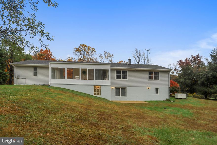 Country living with convenient location. Nice 3/4-bedroom rancher sitting on over an acre of land in Baldwin. This homeowner has recently had the kitchen and baths renovated. Homeowners have also installed a whole house backup generator. There is a three-season room, with entrances from the living room and kitchen, which overlooks the yard with mature fruit trees. There is a huge pantry storage room off the kitchen and 2-car garage. The lower level has a very large recreation/family room with wood burning fireplace, built-in bookcases, and full bath. There is a separate entrance to the lower level.