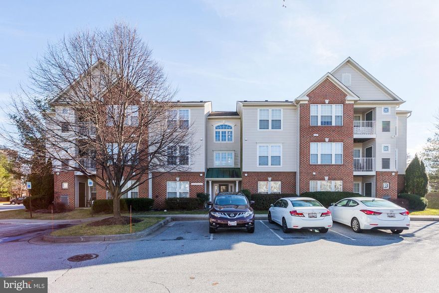 The Obvious Choice in Owings Mills! This stunning, sunlit 2 bed/2 bath upper-level condo features a bright and open floor plan, spacious kitchen with breakfast bar, private balcony, and large windows offering lots of natural light! Entertain friends and family in the versatile living/dining area, highlighted by the dual-sided fireplace. The primary bedroom includes an en suite bath and large walk-in closet, and numerous closets throughout the unit provide additional storage space. The elevator building includes parking, and is perfectly located seconds to major commuter routes, Owings Mill Metro SubwayLink Station, and multiple parks/trails.  Vouchers accepted.  Minimum 600 credit score required.