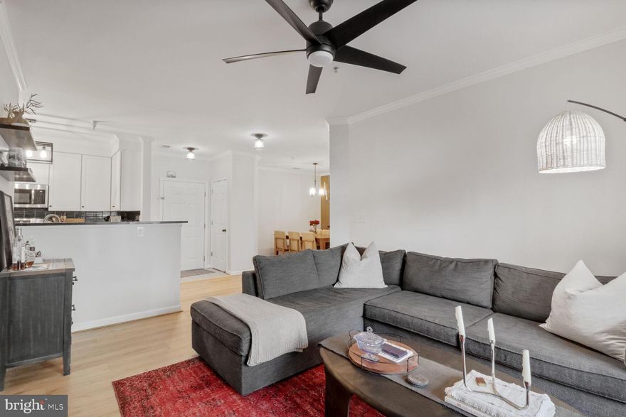 Discover comfort and convenience in this beautifully maintained 2-bedroom, 2-bathroom condo. Just minutes from top shopping, dining, and major commuter routes including I-66 and Route 50, this home is ideal for both everyday living and city commuting. Enjoy a bright, freshly painted open layout featuring a private balcony, a spacious living area with new flooring and a modern kitchen with a newly installed stove/oven. Both bedrooms offer generous closet space and updated bathrooms. The unit also has 1 garage parking space and additional surface parking. Pets allowed!