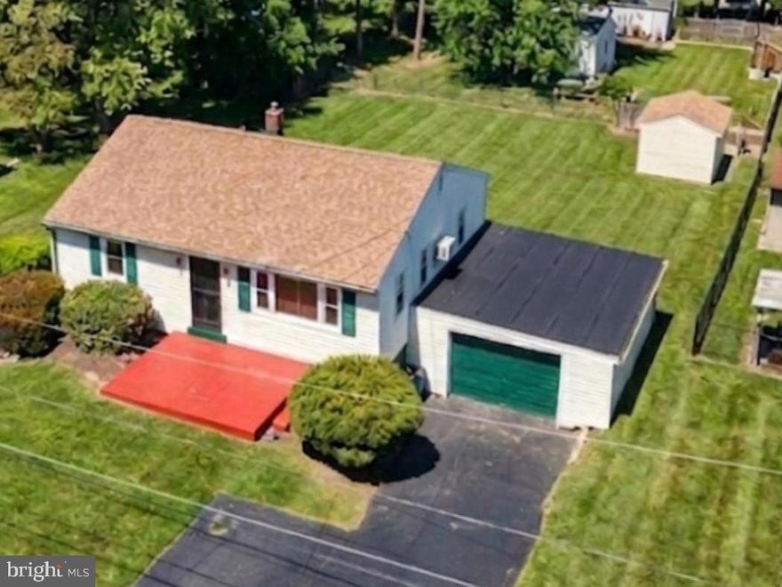 Awesome Single home opportunity awaits you. House is complete with a  bonus room in basement with heat source.   Welcome home to this charming and inviting single rancher located in the highly desirable Neshaminy School District! From the moment you arrive, you’ll appreciate the easy-living lifestyle this wonderful home has to offer. Step inside to discover beautiful contemporary vinyl plank flooring throughout the living room, hallway, and main bedroom, along with hardwood flooring in the kitchen adding warmth and character. The spacious layout offers comfortable everyday living with a cozy and welcoming feel throughout. Enjoy ample parking, a spacious garage, and a full walk-out basement featuring two bonus rooms perfect for home offices, hobby rooms, workout space, or flexible everyday living. Outside, relax under the covered rear patio overlooking the spacious rear yard — perfect for entertaining, gardening, or simply enjoying a quiet evening outdoors.  Don't miss out as there are few to none Single homes in the price range in Lower Southampton. Additional features include public sewer, attractive vinyl siding, and a dimensional roof for added curb appeal and peace of mind. Don’t miss this charming home filled with warmth, comfort, and opportunity!