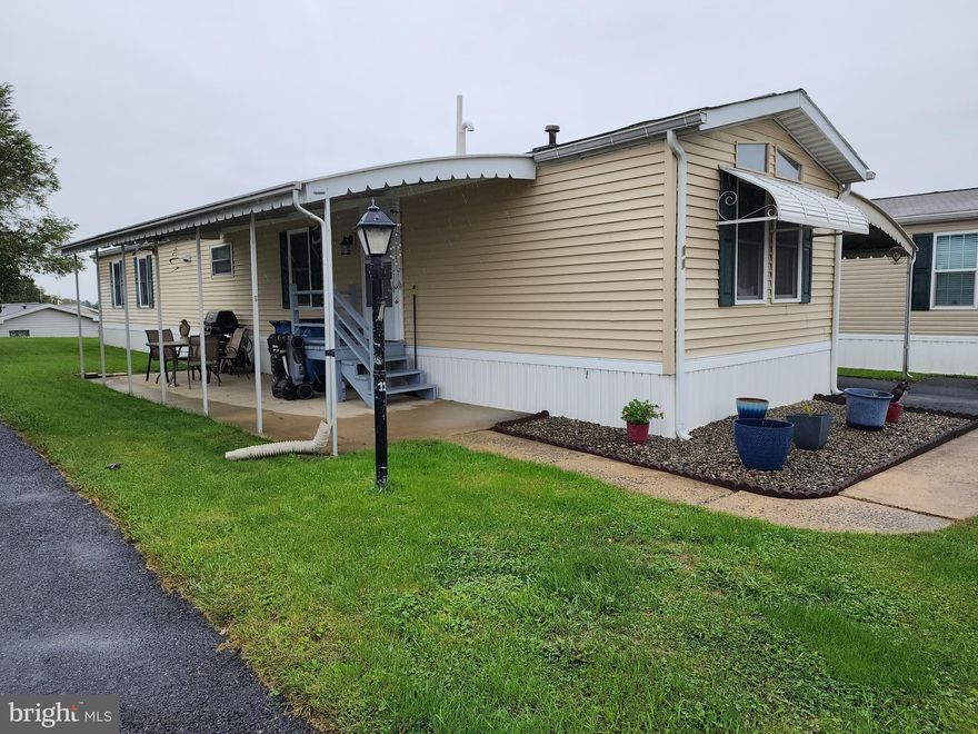 This well-maintained 1987 Skyline 14x72 (OakHaven) singlewide with covered front porch and attached carport offers 1,008 sq ft of living space and 2 beds, 2 baths. Recent updates include: New walk-in shower & bathroom cabinets (2018), updated plumbing (2018), Carport (2018), Central Air & Hot Water Heater(2016), new 2nd bathroom vanity (2015), new shed & windows & vinyl siding (2013), drywall & carpets & kitchen flooring (2013-2015), furnace (2012). Propane Tanks are leased. All appliances and shed convey.  Subject to owner finding suitable housing. Low taxes. RIDGEWOOD MANOR is under new management by RHP PROPERTIES. The new monthly lot rent of $543 will include: Common Area Maintenance, Snow Removal, Water, Sewer, Trash. All ages-pet friendly mobile home community. Rapho Twp/Manheim Central schools. Convenient location to highways, farmlands, Spooky Nook Sports Complex, LCBC church. Just a short commute to airport, Hershey, Harrisburg and Lancaster. see  37 pics. CASH BUYER NEEDED.