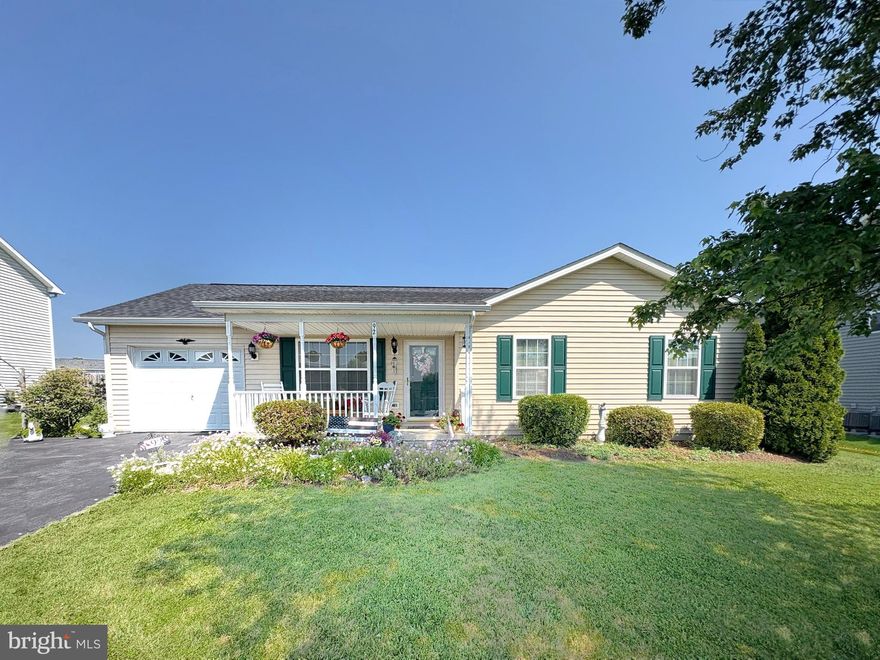 Welcome to this delightful 3 bedroom, 2 bath ranch style home in the Spring Hill Subdivision offering comfortable single level living.  It is perfectly situated on a generously sized .3 AC lot.  This property features a large backyard, ideal for gardening, entertaining, or simply relaxing outdoors. In the spring you will enjoy a beautiful array of blooming flowers such as pink, red, orange, and yellow azaleas, purple rhododendrons, and lilac bushes. While in the summer the beauty continues with crape myrtles, rose of sharon trees, with many other beautiful flowers and, lilies along the back of the yard.  Step inside to the living room which flows seamlessly into the kitchen and dining area, creating a cozy environment for daily living.  Key features include a recently updated roof within the last year,  an attached garage perfect for parking or extra storage, brand new water softener, main floor laundry, and an HVAC system which was updated in 2023.