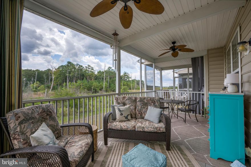 Enjoy the incredible views of the Indian River Bay and Wetlands from multiple rooms and screened porch.  Your full time or vacation home awaits. Sold fully furnished and ready to enjoy immediately.  This home has enjoyed many recent upgrades such as a new roof in 2022, new HVAC System in 2023 with a transferable warranty through 2030. Primary Bedroom has custom closet systems. Discover an exceptional investment opportunity in the sought-after Fairfield at Long Neck community! This stunning 3/4 bedroom, 2.5-bathroom townhouse, boasts contemporary design and excellent condition, making it a prime choice for both homeowners and investors alike. Step inside to find a spacious interior featuring a combination kitchen and dining area, perfect for entertaining. The kitchen is fully equipped and includes stainless steel appliances, including a built-in microwave, electric oven, and island. Enjoy the convenience of an eat-in kitchen island and is enhanced by recessed lighting and ceiling fans throughout. The primary suite with Bay Views offers a comfortable retreat with a walk-in closet and an en-suite bathroom featuring a soaking tub and stall shower. Additional highlights include a screened porch and balcony just off of the Living Room, ideal for relaxing and entertaining while enjoying views of the nearby Indian River Bay. On the top floor there is a spacious loft/bedroom with an open balcony overlooking the Indian River Bay.  This property is not just a home; it's a lifestyle. The community amenities include a refreshing outdoor pool, perfect for summer relaxation, while the association takes care of maintenance, Master Insurance for the Buildings, and snow removal, providing peace of mind for investors. With its prime location near the water and a popular rental market, this townhouse presents a lucrative opportunity for generating rental income. The attached tandem garage and driveway parking add to the convenience, making it an attractive option for your cars, beach toys or storage. Don't miss out on this chance to invest in a property that combines comfort, style, and a promising return on investment! Close to restaurants, shopping and if you are a boater, just down Long Neck Rd., check out Massey's Landing where you can launch your boat, kayak or jet ski.  7-night minimum rental period allowed in the community.