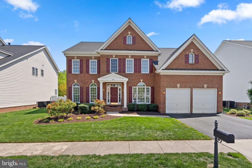 Welcome to 720 Crisfield Way in sought after Kingsport, a water privileged community in Annapolis - minutes to Downtown. This brick front colonial home is move in ready freshly painted and new carpet with upgraded padding throughout.  A two story entryway welcomes you to this incredible home.The gourmet kitchen features a center island with granite countertop, updated pendant lighting, double sink, a large pantry and much more! An entertainer's dream with open kitchen to the two story great room with a gas fireplace, updated chandelier, soaring windows, and great accent wall.  A formal dining room with new chandelier off the kitchen, living room and office space complete the first floor and all freshly painted and new carpet. The upper level has a huge primary suite with an oversized tub and walk-in shower.  The upper level also has  three additional bedrooms, one with an en-suite bathroom and an adjoining bathroom for the other two bedrooms.. The lower level has two finished areas,  one that is perfect for a theater room, game room, second family room or whatever you desire and the second area would make a great au-pair or in-law bedroom suite with a full bathroom adjacent to it. A large unfinished area provides great storage and contains all the utilities. This wonderful home has a two car garage, fenced rear yard and large patio great for summer evenings and the home is close to the community pool. The community water access for launching a kayak is within walking distance. Close to all major commuting routes and downtown Annapolis, 720 Crisfield Way is a wonderful  place to call home! Make sure you check out the 3-D tour - Matterport.