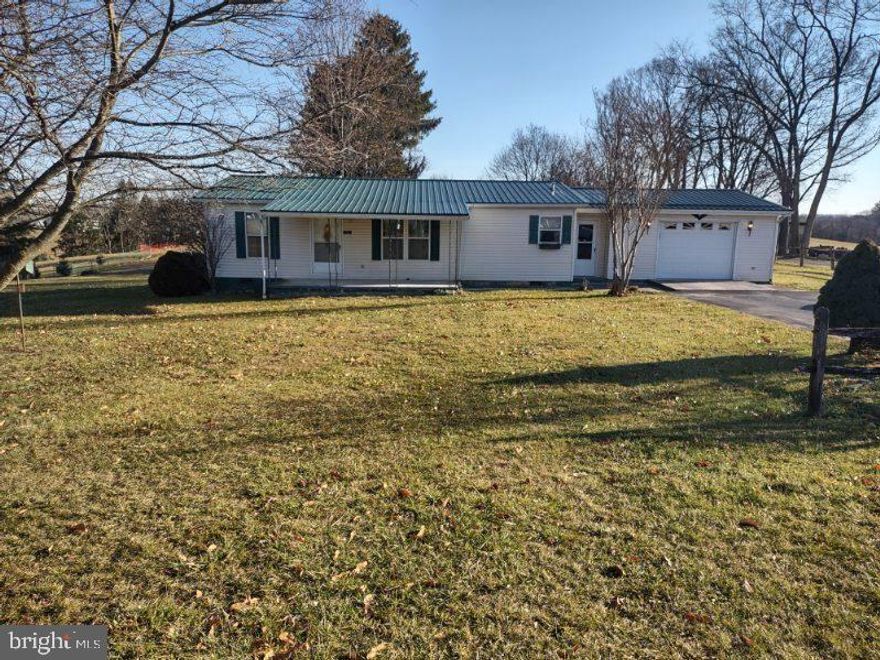 Very well cared for home in move in condition. Over an acre of nice level land. Quiet end of road location with farm fields on one side yet still close to a multitude of conveniences.  Only a few miles from I-81. Multiple detached garage/workshop/storage buildings that were once used for auto restoration and storage. Has potential for many different applications. Automobiles in photos do not covey with the property.