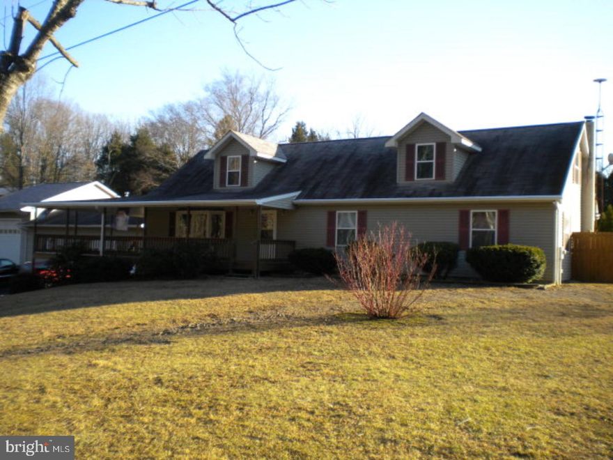 Host all your gatherings in this large home with wraparound porch on 1.75 acres. Oversized 3 bay heated garage. Dog kennel. Walking distance to Sweet Arrow Lake Park. Partially finished, full basement with 1/5 bath. Large kithen with plenty of cabinets and pantry. Eat in your dining area or at the breakfast bar. Pellet stove in living room for supplemental heat. 1st floor laundry (washer & dryer negotiable.) A must see.  Mailing Address Continued: Pine Grove  Color: Clay  Amp: 200