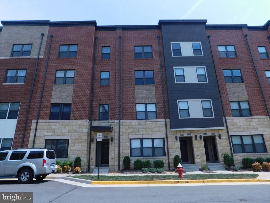 Welcome to this great home, a two-level haven of comfort nestled just steps away from the vibrant heart of One Loudoun! This luxurious lifestyle condo exudes an air of elegance, complete with a rooftop deck and the convenience of a garage. Step onto glamorous, upgraded architectural laminate flooring in a captivating blackened and distressed natural hue, setting the stage for a harmonious ambiance throughout. Journey to the upper level, where three generously proportioned bedrooms await.  The expansive primary suite beckons with a walk-in closet and a master bathroom that indulges in luxury. Two separate vanities and an expansive glass-enclosed tile shower provide the perfect retreat after a long day.  Hurry, this one won't last.