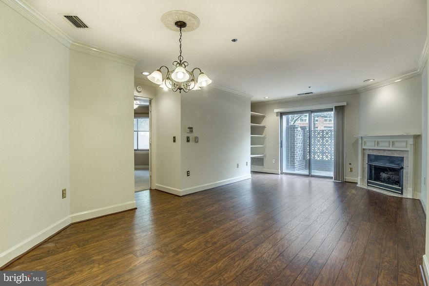 ** BALLSTON PARK CONDO ** ONLY 1.5 BLOCKS TO METRO & EATERIES **  Unique large, private patio! 
 ** Spacious living room with gas fireplace, extra shelving, and wood floors . ** Split bedroom design for maximum privacy.  ** 2 assigned garage parking spaces included in rent  **  Small pets considered on a case by case basis. ** Available August 1st!