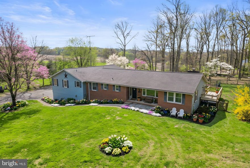 Discover your secluded sanctuary in Carroll County, MD with this stunning 5-bedroom, 4-bath rancher. So much potential! Time to add your finishing touches. Perfectly situated on a sprawling and serene 1.84 acre lot, this home offers both privacy and convenience. Step inside to find an impressive open-concept layout enhanced by natural light flooding through expansive windows. The kitchen inspires culinary creativity offering plenty of cabinet and counter space, seamlessly flowing into the dining area for family gatherings. Outside, enjoy the views from your deck overlooking the gorgeous lot—a true haven for nature lovers.
A unique highlight of this home is the first floor guest suite/apartment addition—so many possibilities…home office, multigenerational living or accommodating guests in style and comfort. 
The unfinished basement offers an abundance of storage space and unlimited potential for adding additional living space to meet your needs.  
Complete with a 5 car garage offering additional storage solutions, every detail has been thoughtfully designed to maximize comfort and functionality. Tucked away yet conveniently located near local amenities, schools, and commuter routes, this remarkable property promises unparalleled tranquility without sacrificing modern conveniences. Embrace serene rural living at its finest! Bring your plans, ideas and vision and make this house your forever home!