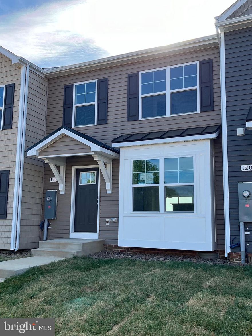 Under Construction.  3 bedroom, 2.5 bath 2-Story town homes featuring spacious room sizes, luxury vinyl plank flooring in main living areas, Bump out in main level family room, and kitchen with island, granite countertops, and pantry.  The Primary Bedroom has vaulted ceiling, walk in closet and full bath with double vanity and tile shower w/ glass door.   10x12 Rear deck included and builder pays 3% closing assistance.  Interior Photos are similar construction, Spring delivery.