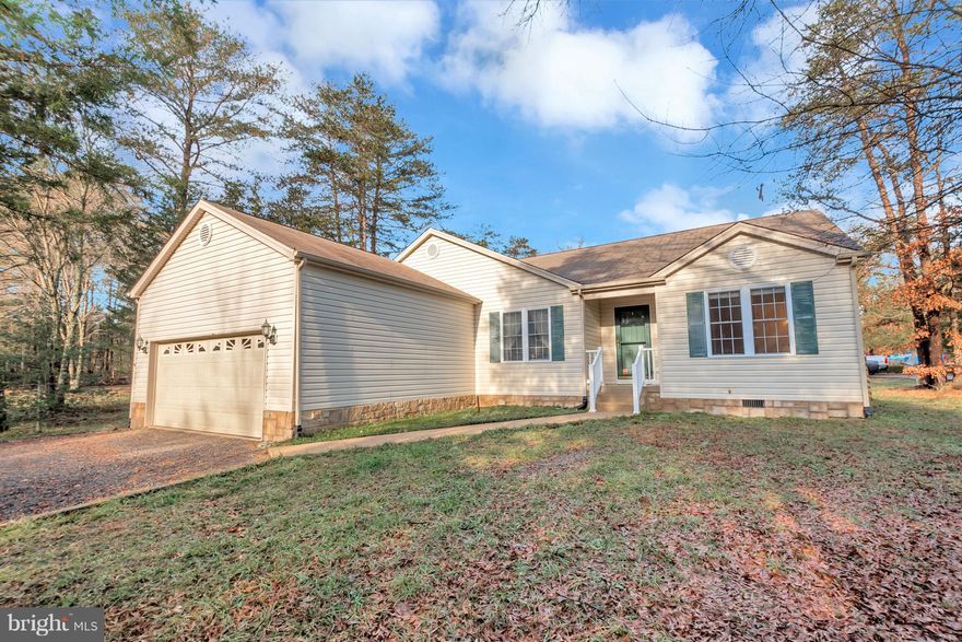 Location! Location! Location!  This open concept, split bedroom floor plan home with gleaming hardwood floors and timeless white kitchen is just waiting for you to call it home.  Enjoy the tranquility of your back deck and screened porch situated on a corner lot at the beginning of a quiet cul de sac. Just a short walk to Hollyfield Park for a game of tennis,  take a swim at Sweetbriar pool  or take in the views at the marina! A private, gated, secured community, Lake of the Woods offers anything and everything you could possibly want. Home to two lakes (the 550 acre main lake and a 35 acre "fishing lake"), a golf course, an equestrian center, a fire and rescue department, and a church all within the gates, Lake of the Woods simply has it all. Whether your passion is boating, waterskiing, kayaking, golfing, horseback riding, or simply taking in the breathtaking views from the clubhouse while enjoying a fabulous meal, from your own deck or yard, or from one of the beaches, you won't be disappointed! Perhaps you'd like a game of bridge or volunteering your time and talents...Lake of the Woods offers more than 60 clubs and/or organizations from which you may choose to become involved. Located in Orange County, we are fortunate to enjoy low real estate taxes. Coupled with home prices ranging from $100,000 to over $2,000,000, Lake of the Woods is the perfect community for both full-time residents, as well as weekenders. But don't take my word for it, please come see for yourself! I will gladly give you a tour of Lake of the Woods by boat and by car so that you may experience why I love Lake of the Woods!