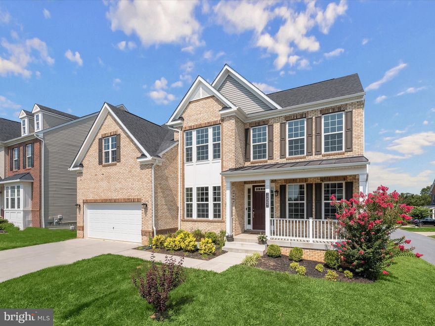***OPEN HOUSE CANCELLED***Welcome home to 12597 Vincents Way in the exclusive Enclave at River Hill. Homes in this coveted community are rarely available. This premiere offering built in 2020 feels brand new. Showcasing the Brookview floor plan by Beazer Homes, this pristine property offers striking variable-width hardwood flooring throughout the main level, a stunning white kitchen, a bright sunroom, and a fully finished lower level. The inviting brick-front exterior, covered front porch and lovely yard space provide timeless curb appeal. There are so many beautiful spaces in which to gather and relax on the main level. The formal living and dining rooms feature ample custom trim work and crown molding. The dining room seamlessly connects to the kitchen via a butler pantry. The magazine-worthy kitchen boasts white glazed cabinetry, quartz countertops, an on-trend gray subway tile backsplash, top-of-the-line stainless steel appliances, and a spacious island offering seating for four. The sunroom is a highlight with its grand Palladian window. The main level office is tucked away off the kitchen providing both privacy and convenience. The mudroom serves as the ideal family drop zone equipped with benches, a coat closet, and built-in cabinetry. The family room is enhanced with designer lighting and a cozy gas fireplace. 

The upper level presents a versatile loft area, ideal for an additional office or a relaxing sitting room. The primary bedroom boasts a trey ceiling, comfortable sitting area, and an expansive walk-in closet. The primary bathroom is equipped with a dual sink vanity with quartz countertops, luxurious soaking tub, and separate shower stall. A guest bedroom with a walk-in closet and en-suite bathroom provides privacy for visitors. Two secondary bedrooms share a convenient buddy bathroom, also with a dual sink vanity and quartz countertops. The laundry room conveniently completes the upper level. 

The lower level includes a spacious rec room, home gym, and a fifth bedroom with an expansive walk-in closet and full bathroom. Additionally, there is an unfinished area that offers excellent potential for extra storage. With easy access to all major Baltimore/DC commuter routes and perfectly located minutes from some of Howard County’s most popular dining and shopping attractions, 12597 Vincents Way won’t last long.