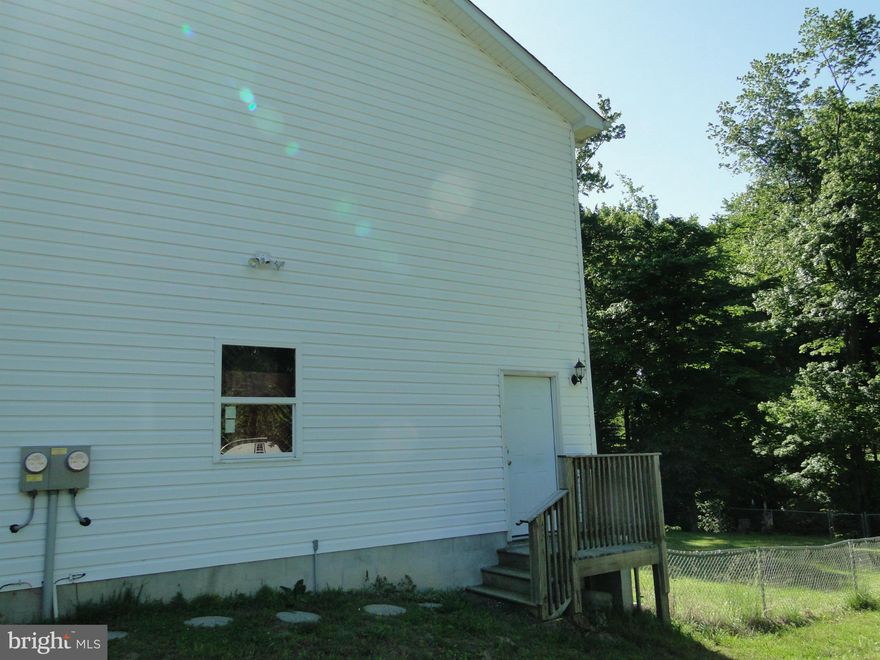 Minutes from the beach, this rental is above garage w/side door entrance. Side yard is for your use also.Parking in garage & in front of garage only.Live here & enjoy the Chesapeake Bay and the water activities,farmers market, boardwalk, restaurants and shopping. Easy commute to DC., Annapolis & Military Bases.Tenant pays all utilities but water & sewer.Rental is cute and cozy.Lawn care provided.