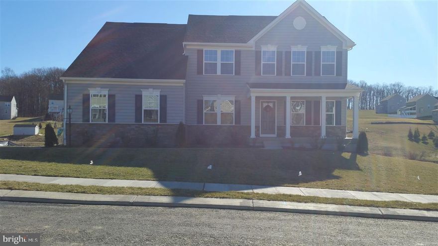 Gorgeous Ravenna built to buyers' specs. Home incl: 4BR/2.5BA, Gour Kitch w/Granite, S/S appl incl Fridge, Isl, Morn Rm, Dedicated Study, Gas F/P in Fam Rm, Lux Owner's Suite w/Sep Tub & Showr. Full Bsmt w/3Pc R/I & WalkOut, 2car Side Entry Gar w/auto opnr & Much More.  Images are representative only.