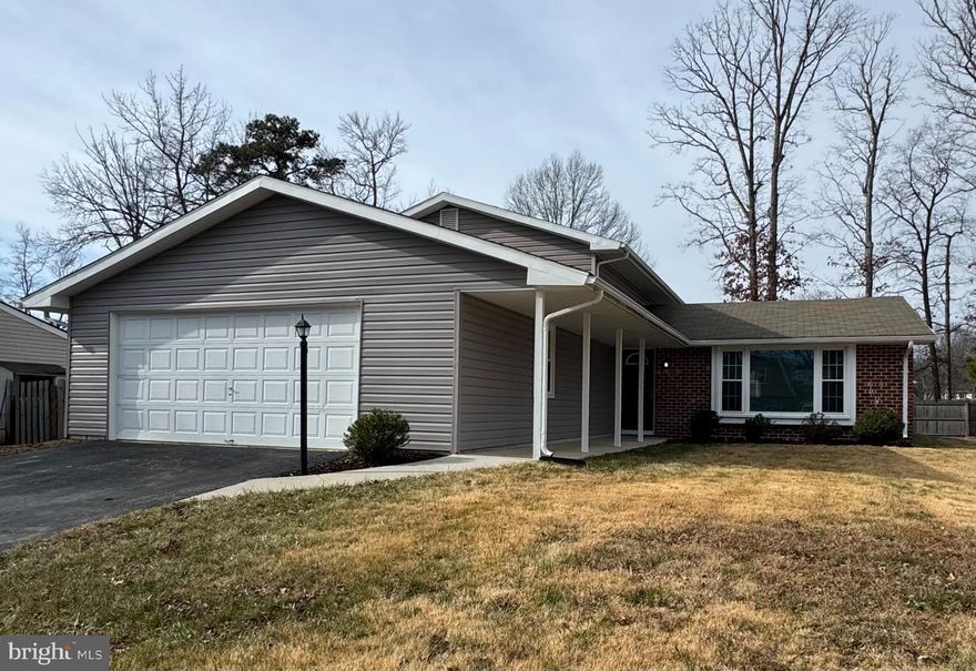 Welcome home to this well-maintained 2.5-story split-level offering space, comfort, and convenience in the desirable Pinefield neighborhood—with no HOA. The entry level features a bright living room, dining room, and kitchen, all enhanced by luxury vinyl plank flooring throughout and blinds on every window. The kitchen is both stylish and functional with stainless steel appliances and granite counter tops.
The upper level hosts the primary bedroom with en-suite bath, along with two additional bedrooms, providing a comfortable and private retreat. On the lower level, you’ll find a fourth bedroom, a full bathroom with laundry, and a spacious family room highlighted by a cozy wood-burning fireplace and French doors that open to the fenced backyard—perfect for entertaining or relaxing.
Additional features include a 2-car attached garage, 2,086 square feet of living space, and a quarter-acre lot. Conveniently located close to Waldorf and Brandywine shopping and dining, with an easy commute to Washington, DC and Virginia, this home offers the perfect blend of space, style, and location.