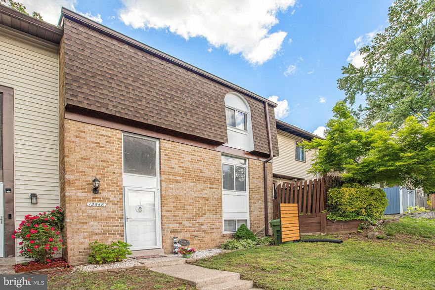 A MUST SEE !!!
This Charming 3 Level Townhome is located in the heart of the Beautifully Planned Community known as Lake Ridge.  It is Move-In Ready with lots of space for furnishings. Gourmet Kitchen has plenty of cabinets.
Large Deck off Main Level looks out on beautiful tree lined section and is terrific for BBQs and entertaining.
Upper Level has 3 Bedrooms and a Large Bathroom with a double sink, bath & shower. Primary Bedroom has a large closet area. Walkout Finished Basement has laundry with Washer/Dryer and an extra fridge.
Freshly Mulched Fenced in backyard with Spacious Tool Shed…complete with new landscape stepping stones.
Retail Shopping, Movie Theaters, Restaurants and Grocery Stores are minutes away. VRE Commuter Rail is nearby and Commuter Parking Lots are strategically located. Lake Ridge has a number of Community Pools and an Active Association that promotes Turkey Trots, Bunny Hops, 2 & 5 Mile Runs and lots of Holiday Fun.
Hospitals and Health Care Facilities are also located nearby. Unknown whether Lower level full bath was permitted.