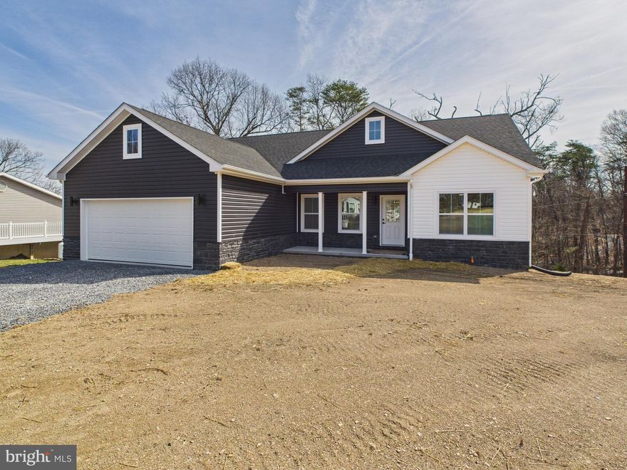 Welcome to this stunning 2x6 framed new construction rancher, perfectly situated on 0.47 acres with a sleek black-and-white theme that exudes modern elegance. Offering 1,629 sq. ft. of finished living space, this thoughtfully designed home features 3 bedrooms, 2 full baths, and luxury vinyl plank (LVP) flooring throughout for both durability and style.

Step inside to an inviting open-concept layout, where the spacious living room seamlessly flows into the quartz covered kitchen, complete with black finishes, upgraded 42" white cabinetry, and SS appliances. The primary suite is a private retreat, boasting a luxurious ensuite bath and ample closet space. Two additional bedrooms and a full bath provide comfort and convenience for family or guests.

Looking for extra space? The 1,629 sq. ft. unfinished walkout basement is already roughed in for a bathroom, offering endless possibilities to customize—whether you envision a recreation room, home gym, home office, or additional living quarters.

Lastly, this home offers public water and sewer. Never stress about a well running dry or accidently building on your septic reserve area. 

Don’t miss this incredible opportunity to own a beautifully crafted home with room to grow. Schedule your tour today!