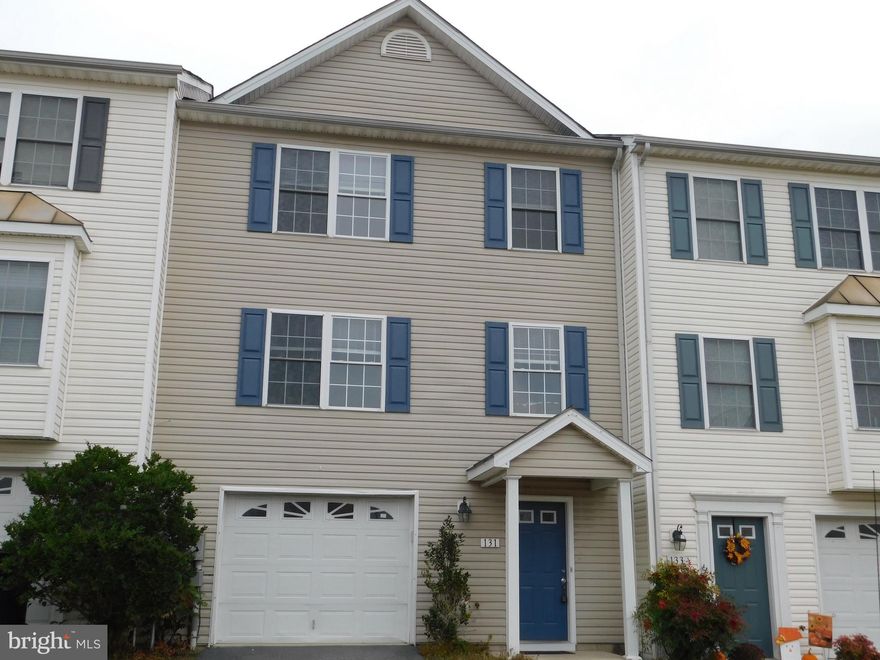 Three levels with garage! Located East of I-81 for commuters!   Newly painted and cleaned.  New carpet in living room.   Large rooms; master bedroom with walk-in closet and full bath and new vinyl; kitchen with  pantry, dining area and access to deck.  All appliances - range, refrigerator, dishwasher, disposal, stackable washer/dryer.  Large garage with auto-opener and access to backyard. Community amenities include outdoor pool!  No Smokers  No Pets  Application required