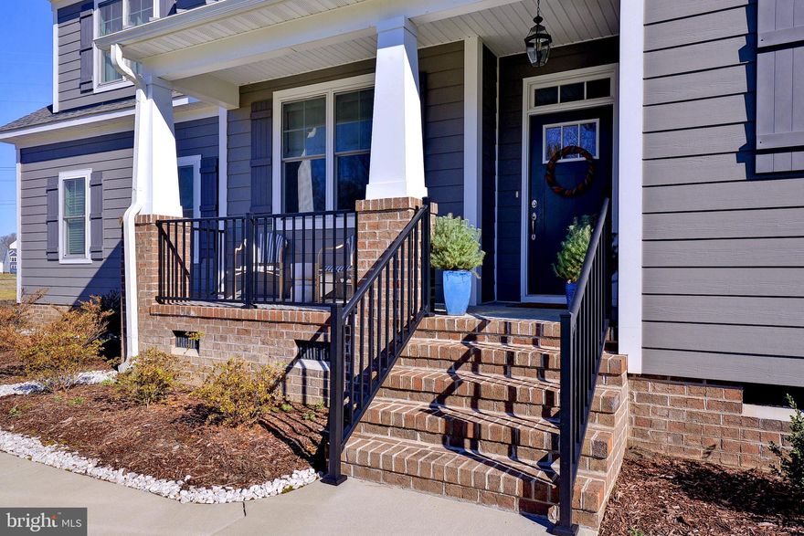 This Like new craftsman style home was built by an Award winning local custom builder.  Built for ease of maintenance, this light filled home features a spacious open floor plan, crown molding, wainscotting, shiplap, LVP and other quality finishes throughout the main level.   The gourmet kitchen includes quartz, all SS appliances with gas range and an ergonomic center island with sink, dishwasher and breakfast bar.  Work from home in the large, 1st floor office or use it as the optional 5th Bedroom. The spacious owner’s suite includes a tray ceiling, 2 walk-in closets and a luxury full bath with walk-in shower.  Two additional bedrooms, a large room over the garage and a 2nd floor laundry complete the upper level.  Planned neighborhood amenities include outdoor amphitheater, tots lot, dog park, kayak launch pad to Poquoson River, walking trails, and picnic area. EZ commutes to Langley, Eustis, Norfolk Navy Base, and other points east and west.