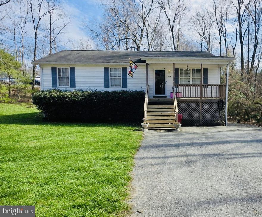 Great rambler with fully finished walk-out level basement!  This 5-bedroom, 3 full bath raised rambler is perfectly situated on a large flat corner lot in the popular Chesapeake Ranch Estates community. Perfect layout with comfortable main-level living - 3 very spacious bedrooms, 2 full baths on the main level plus a huge fully finished basement with 2 more (with full size windows!) bedrooms and another full bath. Step outside to enjoy the amazing back deck (with No maintenance trex decking and vinyl railings!) spanning the entire length of the home and built to support the included hot tub! Corner lot provides both privacy and extra space to spread out and play. All this plus great community amenities including 2 Chesapeake Bay Beaches! Conveniently located right inside the post office entrance to the community. A great place to call home!