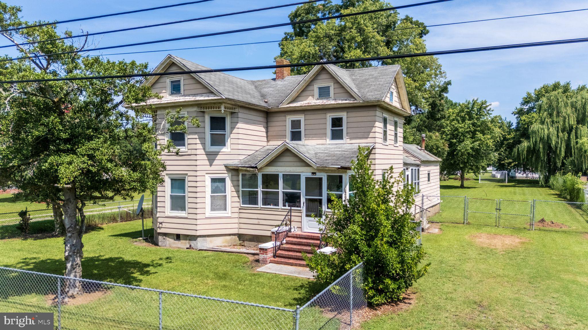 Located in the heart of Crisfield—the “Seafood Capital of the World”—this 4-bedroom, 2-bath home offers a rare opportunity to own a generously sized property in a community known for its serene coastal lifestyle, fishing heritage, and small-town charm.
Step inside to a welcoming foyer that flows into a formal dining room—perfect for gatherings—followed by a generous size kitchen ready for your personal touch. The living room features beautiful bay windows that bathe the space in natural light, creating a warm and inviting atmosphere. A conveniently located utility room adds everyday practicality.
The main-floor primary suite includes its own private bath, while the second floor offers three additional bedrooms and a full bath, providing ample space for guests.
Brimming with potential, this property is ideal for a stylish renovation, a relaxing vacation getaway, or a profitable investment. Just minutes from the Chesapeake Bay, local marinas, and charming waterfront restaurants, it offers the very best of Maryland’s Eastern Shore right at your doorstep.
Bring your vision and make this Crisfield gem your own!