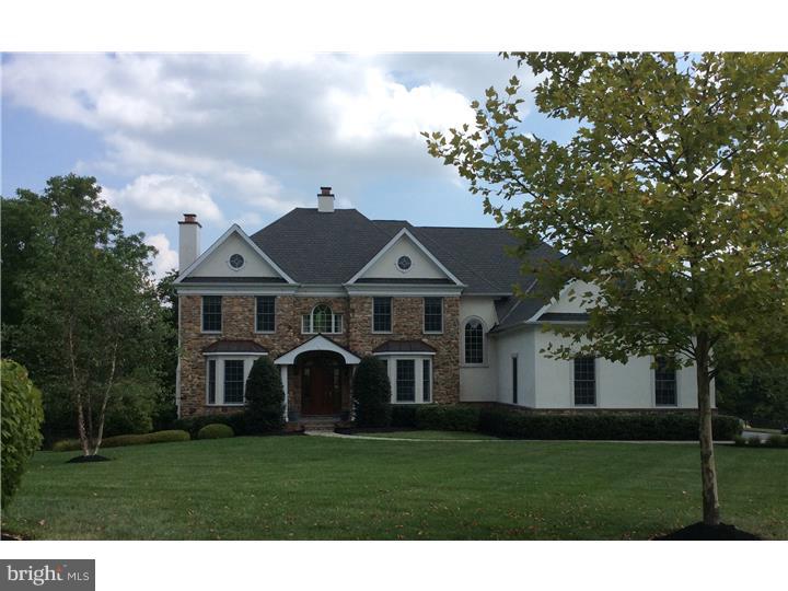 Elegant English Manor estate home exudes curb appeal and timeless style.  A verdant front lawn provides an ideal backdrop for its refined landscape and stone walkway. A gracious entry foyer gives way to newly refinished hardwood floors that grace the entire main level and a sweeping view of transom framed formal fireplaced living and dining room highlighted by exquisite crystal lighting and a columned voluminous family room with two story rows of windows, coffered ceiling and fireplace. The family room is open to an outstanding kitchen offering professional appliances, abundant custom cabinetry, a massive granite center island with generous seating and sun bathed breakfast room with access to the rear deck. A French doored study, laundry room and half bath complete the first floor. Handsome details reminiscent of old world craftsmanship abound and include raised panel wainscoting, deep crown molding, substantial mill work, dramatic lighting, and backstairs. The master bedroom suite is a spa like retreat with a luxurious private bath, sitting room and closet wing showcasing two walk in closets and built in dressing area specially outfitted with rich wood details. A bedroom with a full bath and two additional bedrooms are connected by shared use of an oversized bathroom. The finished daylight walk out basement offers a home theatre, billiard room with wet bar, lounge with fireplace, exercise room and a full bath. Heated 3 car garage, central vac, a security system and in ground sprinkler system are some of the many features within. Set in a cul de sac of 7 homes, the area has great commuter access to major routes in PA and NJ, nearby shopping and conveniences. Luxurious yet welcoming, this property beckons Home Sweet Home.