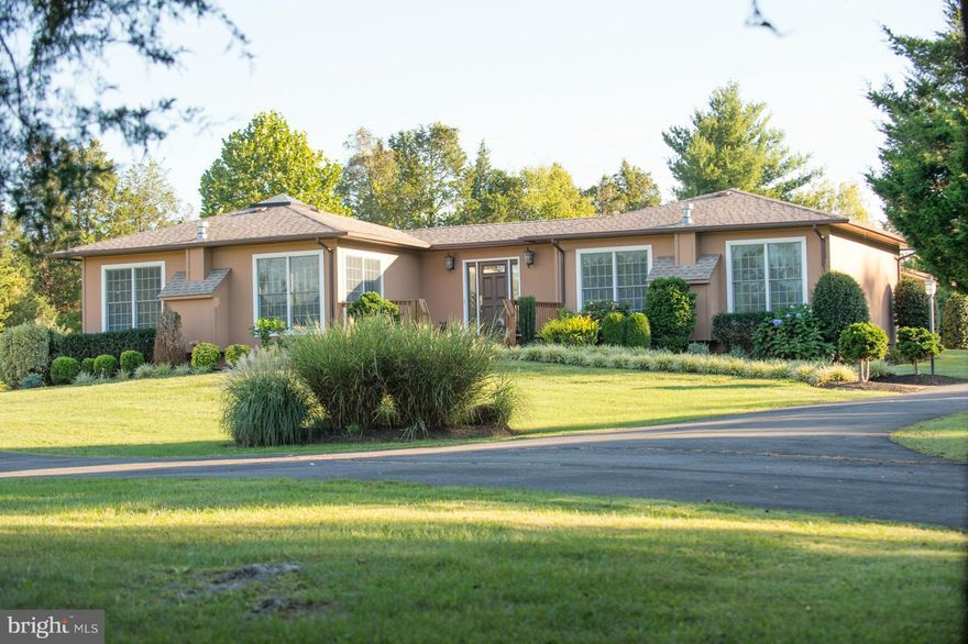 Incredible custom home just 6 miles to Warrenton. Uniquely designed u shape home  w/ inground heated pool, 3 car garage plus detached 40x30 floored workshop w/ lift.  Wood & tile floors throughout, hickory cabinets w/Granite,5 Burner Thermador stove, vaulted ceilings w/ skylight in FR, master suite w/ his & her BA's, 2 additional BR's, BA  & LR on other side. 6 beautiful acres, Generator installed