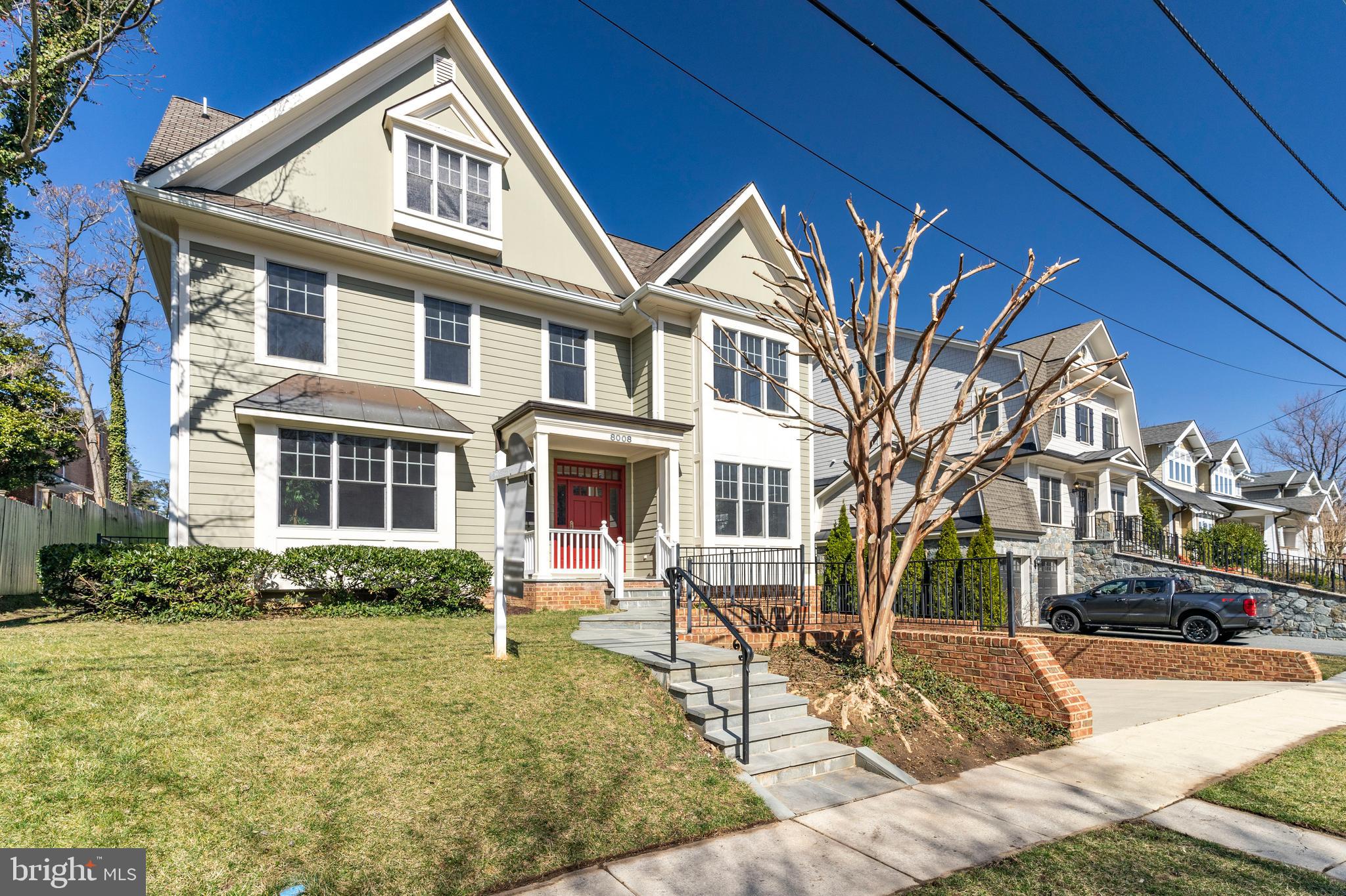 Walk score 93 in downtown Bethesda, just steps to restaurants, shops and bar at the hip Bethesda Triangle. This four level quality Craftsman style home, built in 2006, has been meticulously maintained by the original owner, featuring over 6,000 SF of luxurious living space. At the heart of the home is an incredible Chef's Kitchen with a huge center island that opens to a breakfast nook and spacious Family Room, Dining Room, Library/Den with built-in bookshelves, and Living Room. All spacious and light-filled rooms! Upper level includes Premier Suite with large bath and private balcony, generous walk-in closet with custom built-ins, 3 additional bedrooms and 2 full baths, plus Laundry Room. Large fourth level features 2 additional bedrooms, full bath, and open loft area. Lower level recreation room with 1.5 baths, and storage. Freshly painted throughout, this house is a must see.