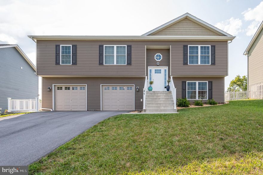 Stunning split foyer home on a prime lot with breathtaking mountain views! 
Welcome to your dream home! This practically brand new split foyer house is ready for its new owners. With meticulous care and maintenance, this property exudes elegance and charm throughout.
Step inside to discover an open floor plan that effortlessly combines the living, dining, and kitchen areas. The spacious layout is perfect for both entertaining guests and enjoying cozy family gatherings. The abundance of natural light floods the interior, creating a warm and inviting ambiance.
The house is loaded with upgrades, ensuring a modern and convenient lifestyle. From stylish fixtures to high-end upgrades, no detail has been overlooked. You could easily have TWO master bedrooms or TWO living rooms - both upstairs and downstairs! 
The updated garage provides ample space for vehicles and extra storage. If you love to work on cars, this garage is going to be perfect for you! Updated LED lighting, and upgraded electric for tools OR plug in for your electric vehicle! 
Now, let's talk about the outdoor oasis that awaits you. Step out onto the huge deck (yes- trex decking with vinyl railing so no maintenance!) and marvel at the majestic mountain views that will leave you in awe. Whether it's savoring your morning coffee or watching the sunset, this deck is the ideal spot for relaxation and appreciation of nature's beauty.
Situated on a prime lot, the location is unbeatable. Experience tranquility and privacy in this serene neighborhood, while still being conveniently close to local amenities, schools, and parks. Perfect for commuters as you are only a couple miles away from Route 81 - but far enough away that you will hear no noise from that! 
Fun unique bonus of this property is the opportunity to pick berries right out of your own backyard! This lot backs to bushes and woods which adds to that peaceful setting of your back deck. 
Don't miss out on this extraordinary opportunity to own your piece of paradise. This split foyer gem won't stay on the market for long! Call now to make this house your forever home.