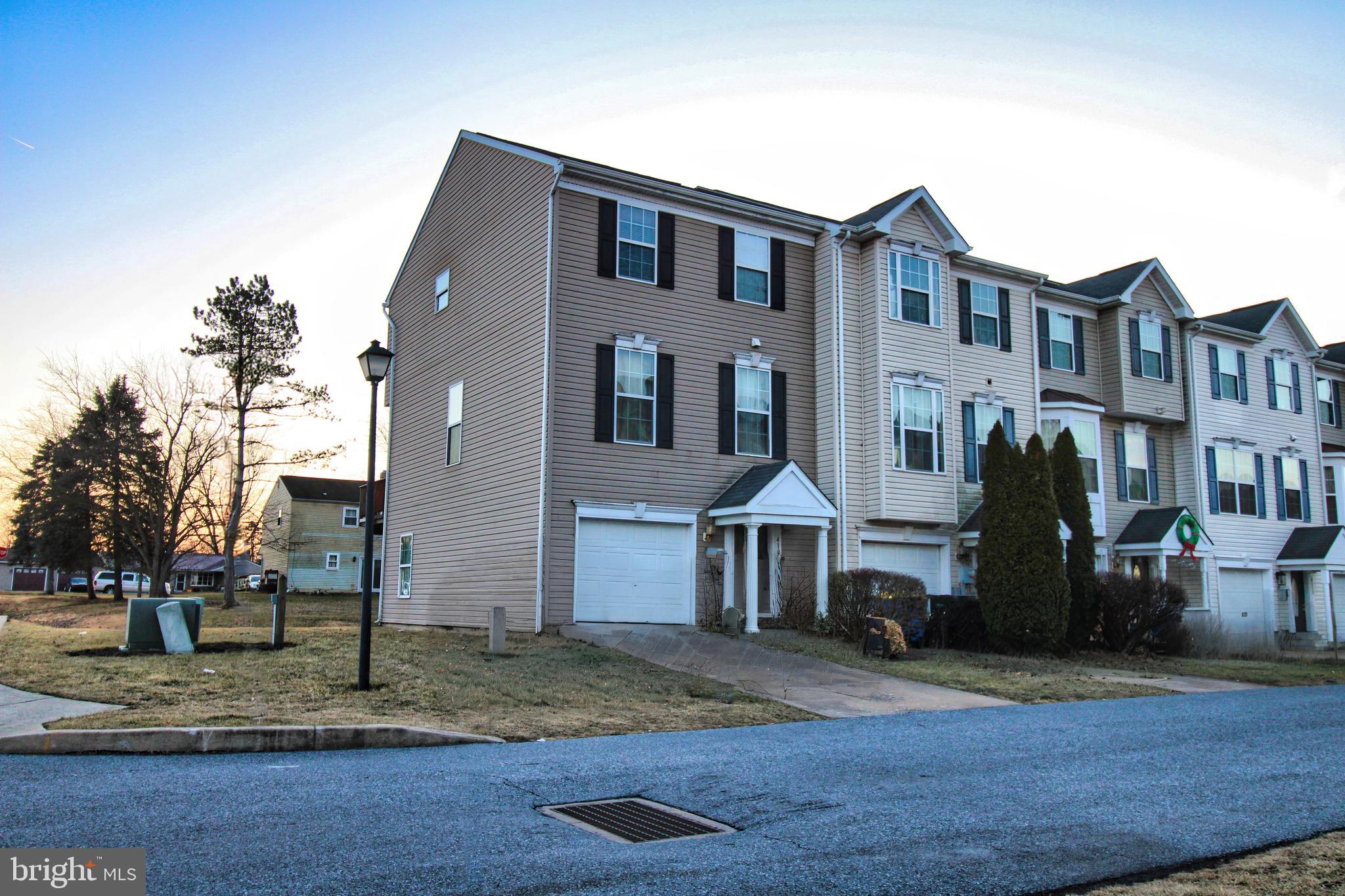 This beautiful, spacious end-of-group townhome has 3 generously sized bedrooms. The primary suite boasts a private en-suite bathroom and a large walk-in closet. The home features 2.5 bathrooms. 3 Finished Levels of living space. Open floor plan connects the living room, dining area, and kitchen, making it ideal for gatherings. 42 in cabinets, kitchen island, pantry, powder room on main living area. New flooring / fresh paint in some areas, the seller will provide an additional floor allowance—garage/driveway. The large deck/ backyard offers a great space for outdoor dining and relaxation with a walkout basement. 1 Year HSA Home warranty included. Schedule your showing Today!