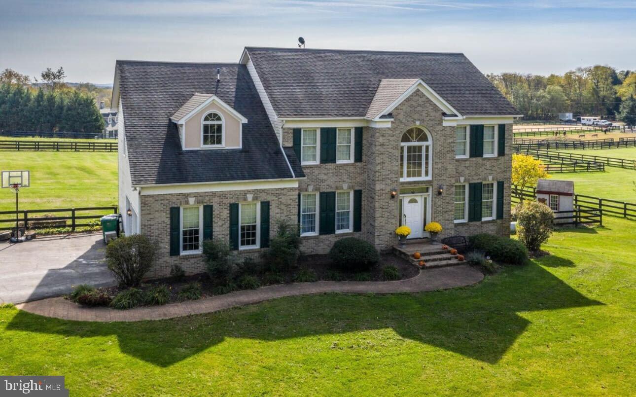 **Accepting back up offers & still allowing showings**Welcome to your own private retreat—a stunning 5-bedroom, 4.5-bath colonial nestled on nearly four acres of picturesque countryside. This custom home is perfectly sited for privacy and breathtaking mountain views, offering endless possibilities for equestrian enthusiasts or hobby farmers.
Step inside to a two-story foyer, where the formal living and dining rooms provide elegant spaces for entertaining. The heart of the home is the expansive two-story family room, bathed in natural light and open to a bright, airy gourmet kitchen. A private office, half bathroom, and mudroom (with plumbing for a secondary laundry room) complete the main level.
Upstairs, the luxurious primary suite boasts a sitting room, jacuzzi tub, and separate shower. Three additional bedrooms and two full bathrooms complete the upper level. The walk-out basement offers over 1,500 square feet of additional entertainment space, along with a bedroom, full bathroom, and laundry room—perfect for guests or multi-generational living.
The true gem of this home is the stunning outdoor space. Enjoy mountain vistas from the deck, screened porch or patio. The pristine center-aisle barn is ready for your horses or hobbies, featuring two stalls, a tack room, heated wash stall, heated tractor garage with utility sink, and a hay loft. A second driveway provides easy barn access, and automatic waterers are installed in the fields for added convenience.
Adding to the charm, the front of the home overlooks the Snickers Gap Christmas Tree Farm, where you can cut your own holiday tree each year! The owners have invested in the larger maintenance items & cosmetic's in the home so you don't have to: Fresh paint, new flooring & stain on all three levels, light fixtures, door hardware, HVAC (2025), New Roof (being installed 2/24/25), Tankless Water Heater (2024), Reverse Osmosis & Whole House Filtration (2024), Generator, Attic & Garage Insulation (2022), Septic Grinder Pump (2024), Washer&Dryer (2022).