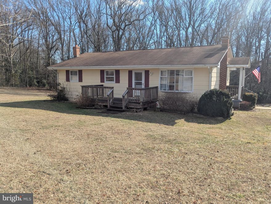 Want a home close to the city of Fredericksburg but quiet like the country. Welcome to 115 Lorenzo drive. In a highly sought after location, this home features almost 2500 SQFT,  3 bedrooms, remodeled 1 1/2 bath, basement, detached garage with its own heat/cooling system, and plenty of yard for activities.  Basement includes a bar, large open area, and even an extra room for office or extra bedroom. This home has strong bones, great for starter home to start building equity quickly, even features a wood stove to help keep the home warm.