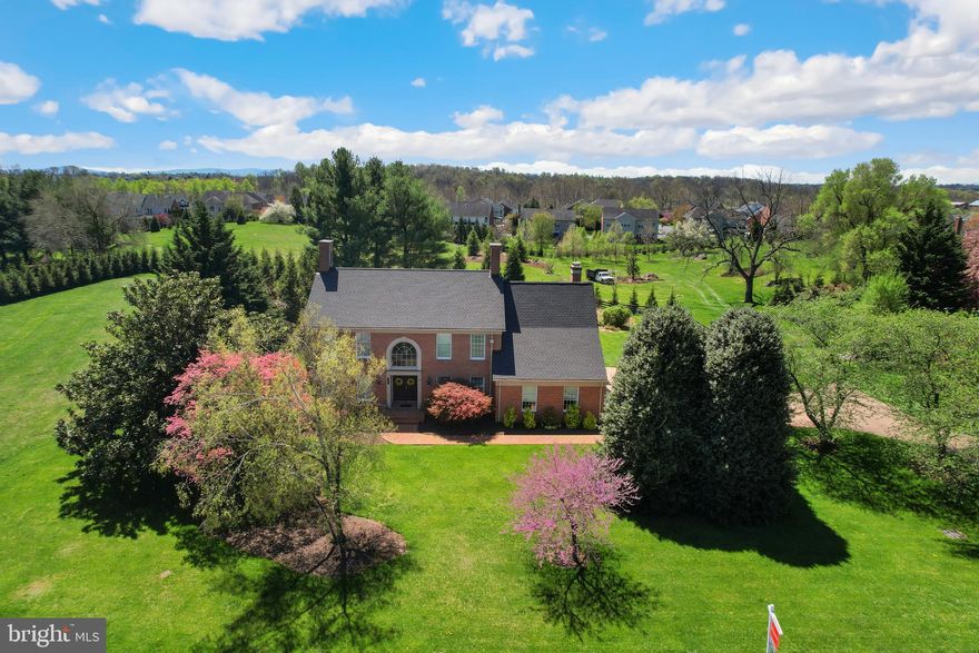 Winchester City - All Brick Colonial on over 1/2 Acre Lot *Features include 4 Bedrooms *3 Full Bathrooms *1 Half Bath *4,300 Sq. Ft of Three Level of Living Space *Finished Walk-up Basement *In-Ground Heated Pool with New (2024) Motorized Safety Cover *Pool/Pump House with Additional Full Bathroom *Landscaped and Fenced Rear Yard with 6’ Aluminum Decorative Fencing *Heated Hot Tub with Cover *Oversized Composite Rear Deck *Paved Driveway *2-Car Side Load Garage *4-Season Vaulted Ceiling Sunroom *Main Level Office *Hardwood Floors on Main Level *Separate Dining Room *Recessed Lighting *Dedicated Laundry/Mud Room on Main Level with Washer/Dryer *Multiple Walk-In Closets *Bonus/Game Room and Recreation Room *Built-In Flat Screen Ready Television Cabinet and Book Cases *5 inch Base Casing, Window Box and 2-Piece Crown Moulding *30 inch Wood Kitchen Cabinets *Kitchen Island *Corian Solid Surface Countertops *Built-In Eat-In Kitchen Seating *Dedicated Pantry *2-Zone Heating and Cooling *Built-In Entertainment Bar in Recreation Room with Beverage Refrigerator *Oversized Primary Bathroom with Double Closets and Double Bowl Vanity *Soaking Tub and Step-In Shower In Primary Bath *Double Vanity Hall Bath *Invisible Fence Dog Containment System *All Brick Low Maintenance Exterior *High Speed Internet *Sought After School Assignments *Roof Replaced in 2023 *Water Heater in 2020* *Pool Pump Replace in 2020 *Pool Motorized Cover Replace 2024 *Minutes from Hospital and Downtown Winchester *Close to Shopping and Dining.