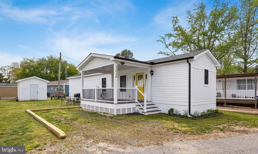 Welcome to easy living in Love Creek, Lewes. This beautifully updated 2-bedroom single-wide home, renovated in 2025, is move-in ready with a refreshed interior and comes furnished. Recent upgrades include a thoughtfully renovated kitchen with quartz countertops and stylish new cabinetry, along with new flooring, drywall, fresh paint, updated windows throughout, new siding, and recessed lighting. The home also features new front and back porches, perfect for relaxing and enjoying the outdoors, as well as a new shed for additional storage. Whether you're looking for a full-time home or a weekend getaway, this property offers comfort and convenience in a great coastal location.