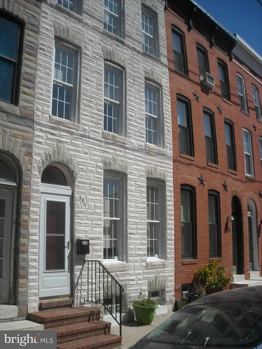 Must see this large 3 sty 14' wide TH on lovely Riverside. This grand old TH boasts 3 lg private bedrooms and 2.5 baths. Enter 1st fl entry foyer into parlor with art. Fplace and natural brick walls and recessed lights.LR and DR as well as Eat in Kit, laundry room/powder room on 1st fl. Enjoy a great view of outer harbor and Domino Sugar sign from 3rd floor deck.