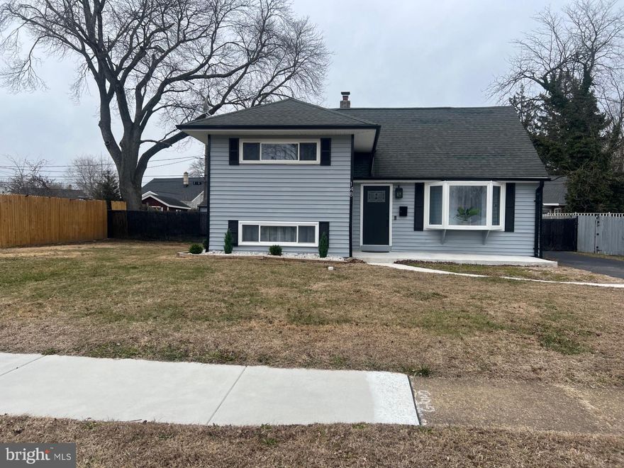 Welcome to 148 Brookside Blvd, a charming Single Family home located in the heart of Newark, Delaware. This beautiful property was built in 1954 and offers a perfect blend of charm and modern amenities. Welcome to this fully renovated split-level home offering 1,720 square feet of modern living space. This beautifully updated 3-bedroom, 2 full bathroom residence features recessed lighting throughout and an inviting, open layout ideal for both everyday living and entertaining. The main level boasts a bright living room and dining area that flow seamlessly into a stunning kitchen complete with abundant cabinetry, quartz countertops, stainless steel appliances, and a custom tile backsplash. The primary suite, located on its own level, offers exceptional privacy and comfort and includes a separate room dedicated to a walk-in closet. The additional two bedrooms are generously sized and feature barn-door closet entries with custom closet organization systems. The second-floor full bathroom showcases a custom floor-to-ceiling tiled tub/shower and a smart LED dimmable mirror. The finished lower level provides an additional 430 square feet of flexible living space, ideal for a family room, home office, or additional bedroom, along with a second full bathroom featuring a custom floor-to-ceiling tiled shower. Additional upgrades include conversion from oil heat to a high-efficiency heat pump HVAC system, new windows, new exterior doors, updated plumbing, new flooring throughout, and recessed lighting in every living area. The home is also equipped with all window treatments, a Ring doorbell, and fire extinguishers. Outside, enjoy a fully fenced rear yard, a 10 x 18 storage shed, and ample space for outdoor entertaining. Sidewalks and patio areas have been updated to complement the home’s exterior improvements. Conveniently located near major roadways, shopping, dining, entertainment, the University of Delaware, and downtown Newark, this home offers modern comfort, thoughtful upgrades, and true move-in-ready living.
