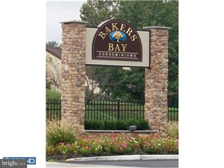 Rarely offered 1st Floor 1 Bedroom Corner Unit with Den! Beautifully landscaped gardens outside all new windows. The Newer sliding doors (keyed) lead to a private patio just steps to your designated parking space. The heater and AC units were installed 2004, hot water heater 2008. Upgrades include a gas fireplace with marble mantle, Granite countertops and newer Stainless Steel appliances. Plush carpeting thru-out (transferable carpet cleaning plan)and custom window treatments. Washer and Dryer included. Convenient location, close to shopping, restaurants, transportation, train station.... Beautiful clubhouse, indoor and outdoor pools, fitness room, game room, social activities, library, plus tennis courts. And that's not all... shuttle service to train station and area markets AND a Pier on the Delaware to enjoy. Assigned parking #178