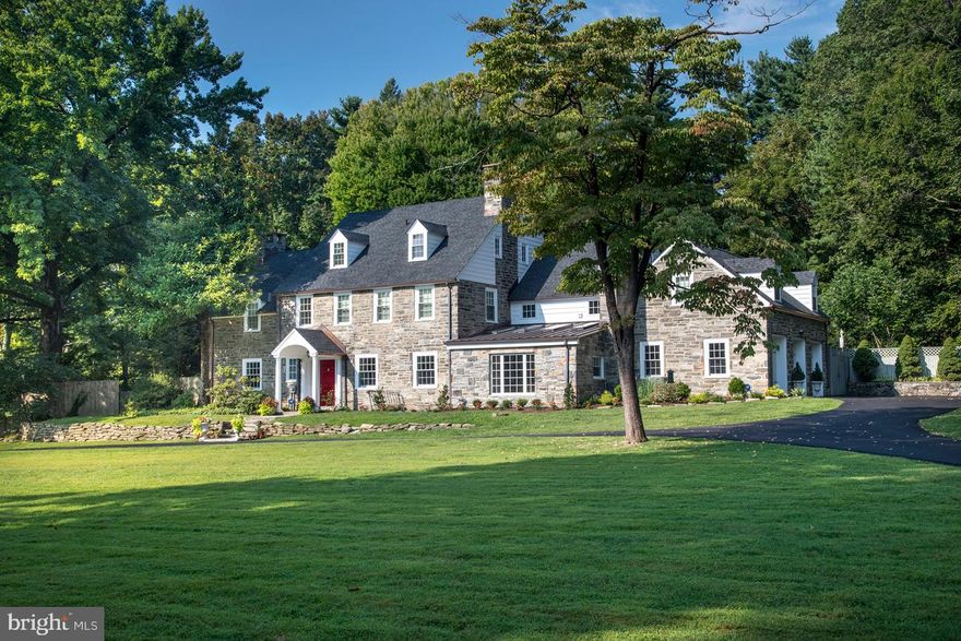 This picturesque paradise, a short stroll from the center of Gladwyne Village, combines the classic elegance of a Main Line Colonial with the modern amenities of an impeccably renovated home built with family and openness in mind. The sophisticated stone house, with its fine copper accents, sits prominently on 2+ acres of park-like grounds, well-positioned with a circular driveway at the center point of a highly coveted street. Enjoy the peacefulness of a fully-fenced and completely usable backyard, ideal for gardening, bird watching, and sports/games. Daydream on your hammock under the shade of stately trees and then join the fun at the oversized heated pool, perfect for summer sessions yet nearly invisible in the off-season. Access the interior conveniently from all sides, and you will notice that through exacting standards and the highest quality materials including stereo/wi-fi throughout, this well-loved home has been granted another 100 years. The gracious foyer welcomes you in with its original wide-plank oak floors that open seamlessly into the adjacent living and dining rooms and private den. The fireside living room features custom cabinetry and a door to the covered flagstone terrace for al fresco dining, set against the backdrop of sprawling grounds. The dining room, with its inviting fireplace, picture moldings and corner china cabinet, leads to both the gourmet chef's kitchen and the sun-drenched family room, announcing that this area is truly the heart of the home! The spacious and well-appointed professionally designed kitchen features a walk-in pantry and provides the ideal setting for entertaining or for enjoying the closeness of a family meal. The updated open floorplan allows for effortless flow into the adjacent family room with four enlarged skylights and grand picture window that optimize natural light throughout the year. Ascend either staircase to the 2nd floor and enjoy the privacy of the expansive master retreat, including a fireplace, cathedral-ceiling office with balcony, dressing room, and spa bath. Down the hall are 4 bedrooms served by 3 full baths. A secluded suite on the 3rd floor accommodates in-laws or extended-stay guests. The dry lower level offers a year-round recreation room with a stone fireplace wall, new powder room, and abundant storage space. All of this and, amazingly, you are still conveniently close to Gladwyne's market, schools and parks, shopping in Suburban Square, and just 12 miles to Center City Philadelphia!