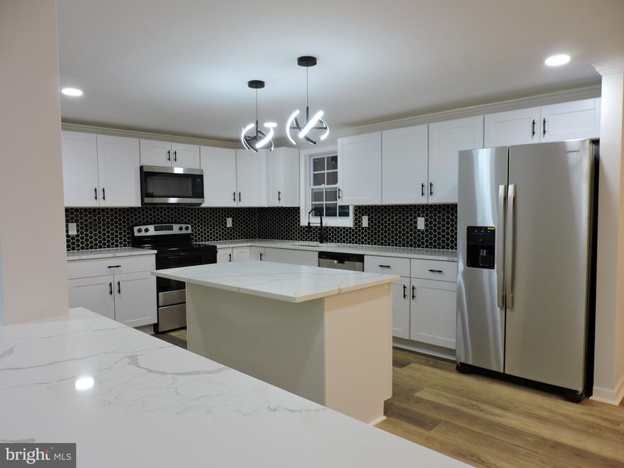 Discover your perfect haven in this stunning detached 2-story residence. With 4 spacious bedrooms and 2.5 bathrooms, new HVAC System and Water Heater, this home exudes elegance and comfort. The modern kitchen features stainless steel appliances and breathtaking quartz countertops, perfect for culinary enthusiasts. Intricate crown moldings and recessed lighting add warmth and sophistication throughout.

The detached 2-car garage offers endless possibilities for creative pursuits and hobbies. Ideally located in a desirable area, this home balances convenience and tranquility, with shops and restaurants just a short distance away.