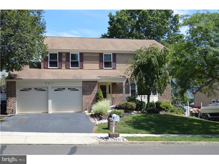 Beautiful colonial featuring four bedrooms, two and a half baths and oversized garage! Immaculate home with corian countertops in the kitchen, custom lighting, newer appliances and flooring. Fresh paint, neutral carpeting, move right in.  The sunken family room with French doors leads to your custom deck and pool. Beautiful pavers lead the way to the yard with landscaped plantings. A large living room features plenty of light thru picture windows leading to a spacious formal dining room. Upstairs the master suite with walk in closet and marble bath provides an oasis of relaxation.  A hall way leads to three more bedrooms for the family and second full bath with marble sink and tile floors. Conveniently located laundry room is on the first floor with a half bath. A full basement for your storage needs. Oversized two car garage also offers storage. New windows. The heater & a/c are 7 years young. This immaculate home has been totally upgraded. Call for your appointment today!