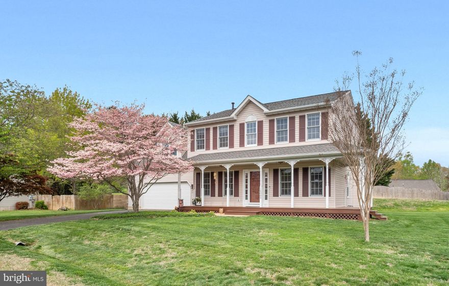 Welcoming wrap front porch and a rear patio offer perfect outdoor space just in time for Spring and Summer activities. A large two-car front-load garage ready to pull in and unload the groceries provides shelter from Spring Showers that allows all the May flowers. And what a beautiful yard this is! The beautiful foliage adds the finishing touches to your exterior setting. Step inside and take a peek at your new home. Formal rooms such as living rooms and dining rooms with wood flooring offer great spaces for family gatherings for many of the upcoming holidays. Just off the dining room is an updated kitchen with stainless steel appliances, great counter space and lots of cabinets. A well-lit filled area perfect for your table and chairs, large pantry and access to a private rear yard. The family room with its gas fireplace is open to the kitchen area, offering a perfect flowing floor plan. Make your way to the upper level, boasting a primary suite and primary bathroom that will knock your socks off! The upstairs laundry room and three additional bedrooms along with a full bath complete the upper level floor plan. The full partially finished basement offers rough-in-plumbing for a full bath and is ready for a layout that will suit your family's needs. 

We are excited to have you visit!